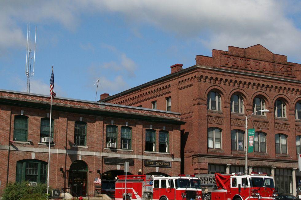 Fire engines in front of fire station,	 	St. Johnsbury	Vermont