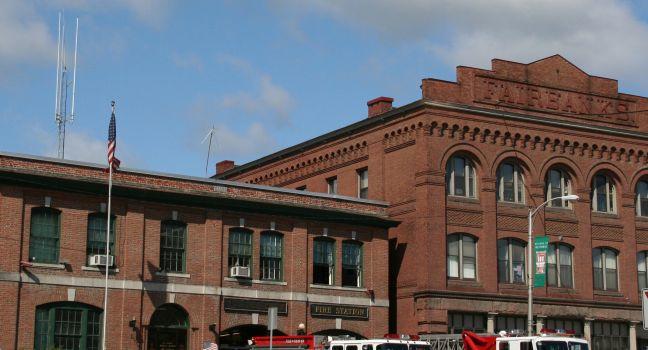 Fire engines in front of fire station,	 	St. Johnsbury	Vermont