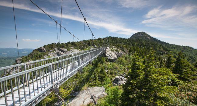 Grandfather Mountain near Linville, North Carolina, is known for its mile-high swinging bridge, the highest in America.