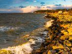 Waves on rocks on the Chesapeake Bay, in Tilghman Island, Maryland.