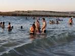 ZICHRON YAAKOV, ISR - AUG 07: Visitors at sanctuary Dor Habonim beach on Au 07 2009. It's one of the top 10 most beautiful beaches in Israel!