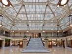The main lobby of the Rookery building with its glass ceiling and amazing stairs. Chicago downtown, Illinois, United States.