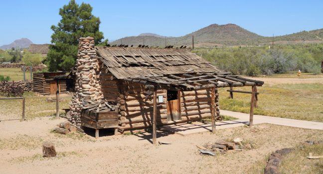 This building is an original structure moved to Phoenix, Pioneer Village, from the Payson area. It represents the type of housing used after the homesteaders arrival in a new area and was common in eastern and northern Arizona, where timber was readily ava