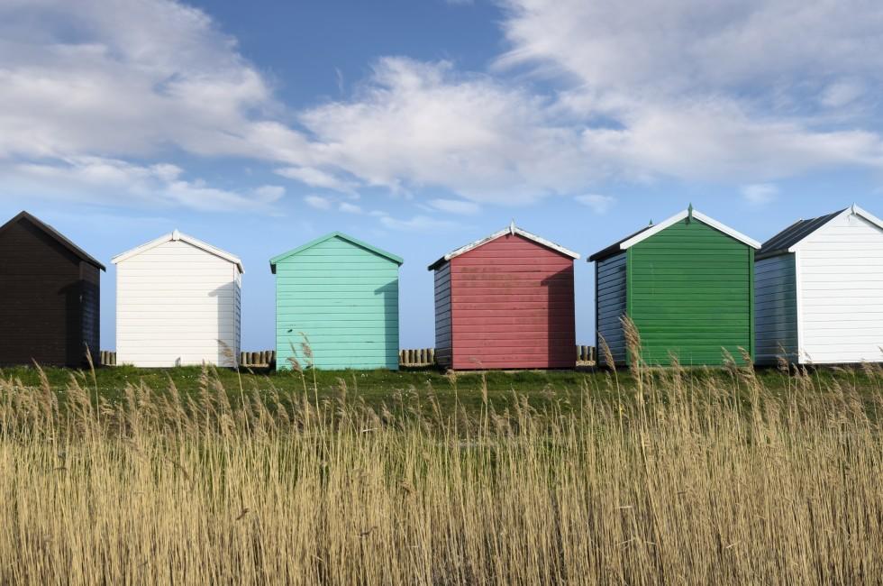 Colorful Beach huts at Calshot on the Solent near Southampton in Hampshire.