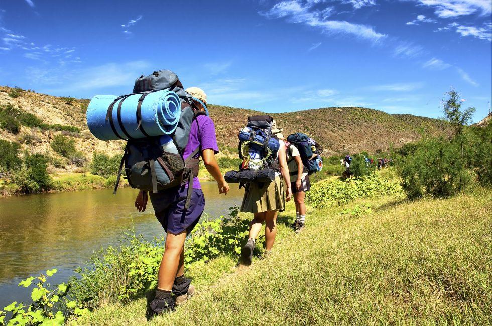 Teen girls walk next to river in mountains. Shot in the Langeberge highlands near Grootrivier river, Garden Route, Western Cape, South Africa.; Shutterstock ID 11046172; Project/Title: Photo Database Top 200