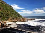 Suspension bridge over the river mouth of the Storms River in the Tistsikamma National Park, South Africa.