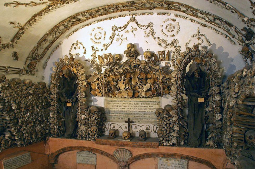 The Capuchin Crypt is a small space comprising several tiny chapels located beneath the church of Santa Maria della Concezione dei Cappuccini on the Via Veneto near Piazza Barberini in Rome, Italy. It contains the skeletal remains of 4,000 bodies believed 