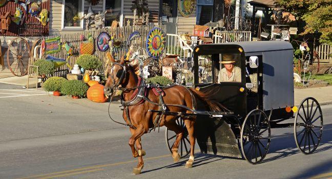 An image that captures the mix of tradition and today's commerce in Intercourse Village, PA. Photo taken on: September 23rd, 2015 