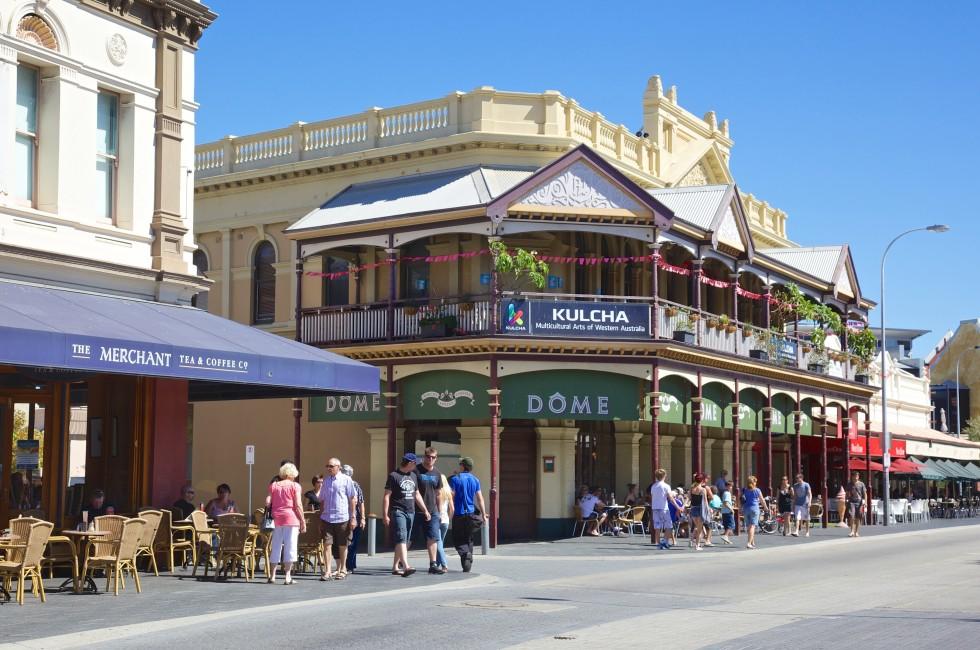 FREMANTLE, AUSTRALIA - APRIL 3, 2011: Shoppers and tourists in Fremantle's 'Cappuccino Strip', an area jam-packed with lively restaurants, historical pubs, small funky bars and micro breweries.; 