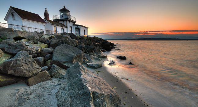 West Point lighthouse at Discovery park Seattle at dusk.