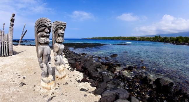 The Ki’i guard the Temple of Hale o Keawe at Place of Refuge in Kona Hawaii.