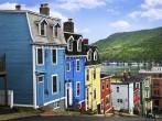 Street with colorful houses near ocean in St. John's, Newfoundland, Canada; 