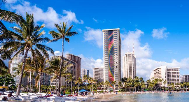 OAHU, HI - JUNE 22 -The Rainbow Tower at the Hawaiian Hilton Village on Waikiki beach on June 22, 2013. The Hawaiian Hilton Village is very popular with families traveling to Hawaii.; Shutterstock ID 187974494; Project/Title: 20 Best Places to Celebrate Ne
