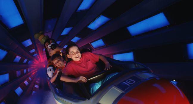 BLAST OFF! — Rising 183 feet above the futuristic Tomorrowland