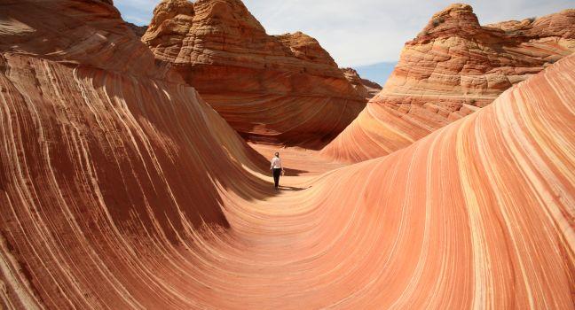 Vermilion Cliffs National Monument; hiker at the "Wave"; 