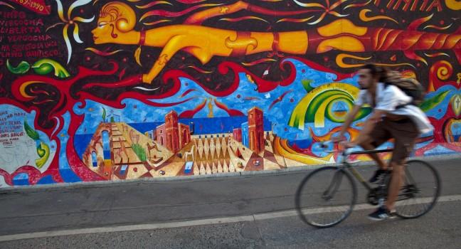 Bicycle rider, East Side Gallery, Berlin, Germany 