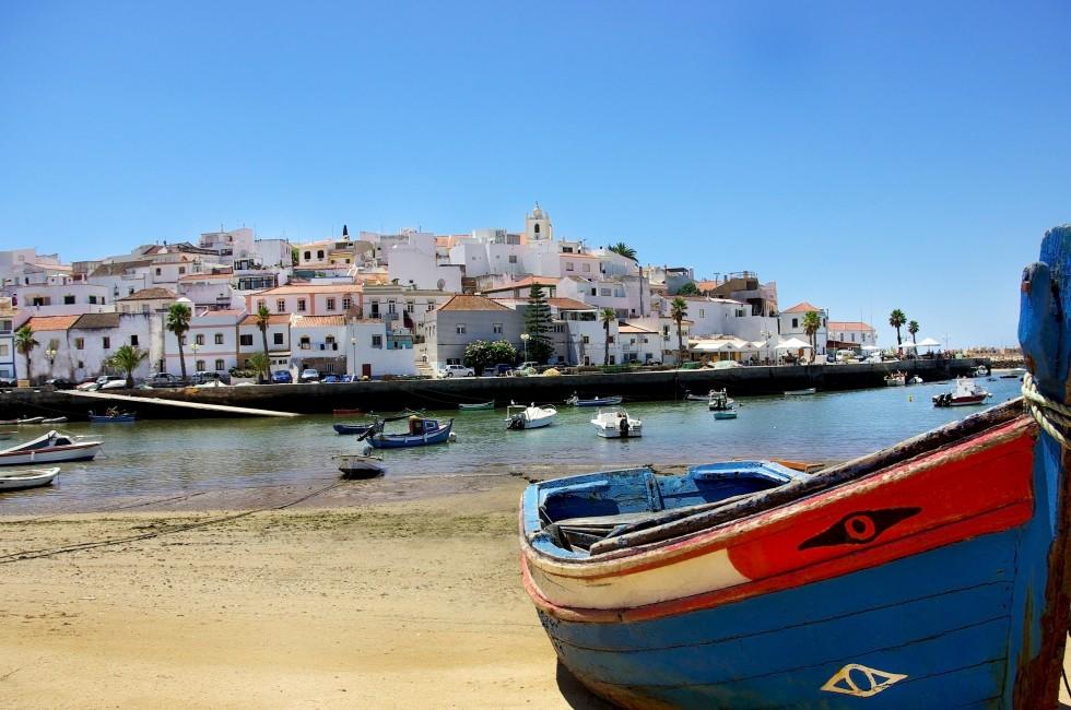 Boat at Ferragudo bay, Algarve.; Shutterstock ID 43751104; Project/Title: Fodors; Downloader: Melanie Marin