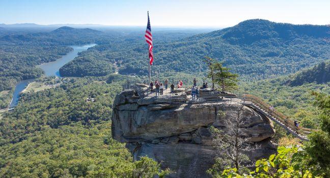Chimney Rock, NC, USA - October 17: Chimney Rock State Park with Lake Lure in the background on October, 17, 2014 in Chimney Rock, NC, USA.