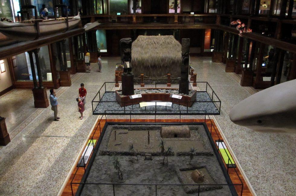 HONOLULU, HI - FEBUARY 25: People explore the Hawaiian Hall Exhibit at the Bishop Musuem taken Febuary 25, 2012 Honolulu, Hawaii.
