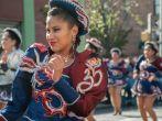 Woman performing in traditional costume in Bolivian parade, Jackson Heights, Queens, New York.