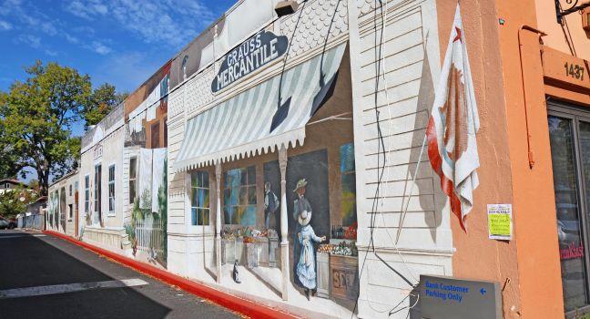 CALISTOGA, CALIFORNIA - OCTOBER 6 2012: Trompe l'oeil mural by Carlo Marchiori on the side of a building. Historic Calistoga is a popular tourist stop at the north end of Napa Valley wine country.