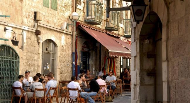 JERUSALEM - AUG 17:Young Israeli people in a cafe in Nahalat Shiva on Oct 17 2007.Jerusalem has been the holiest city in Jewish tradition since King David of Israel first established in 1000 BCE.